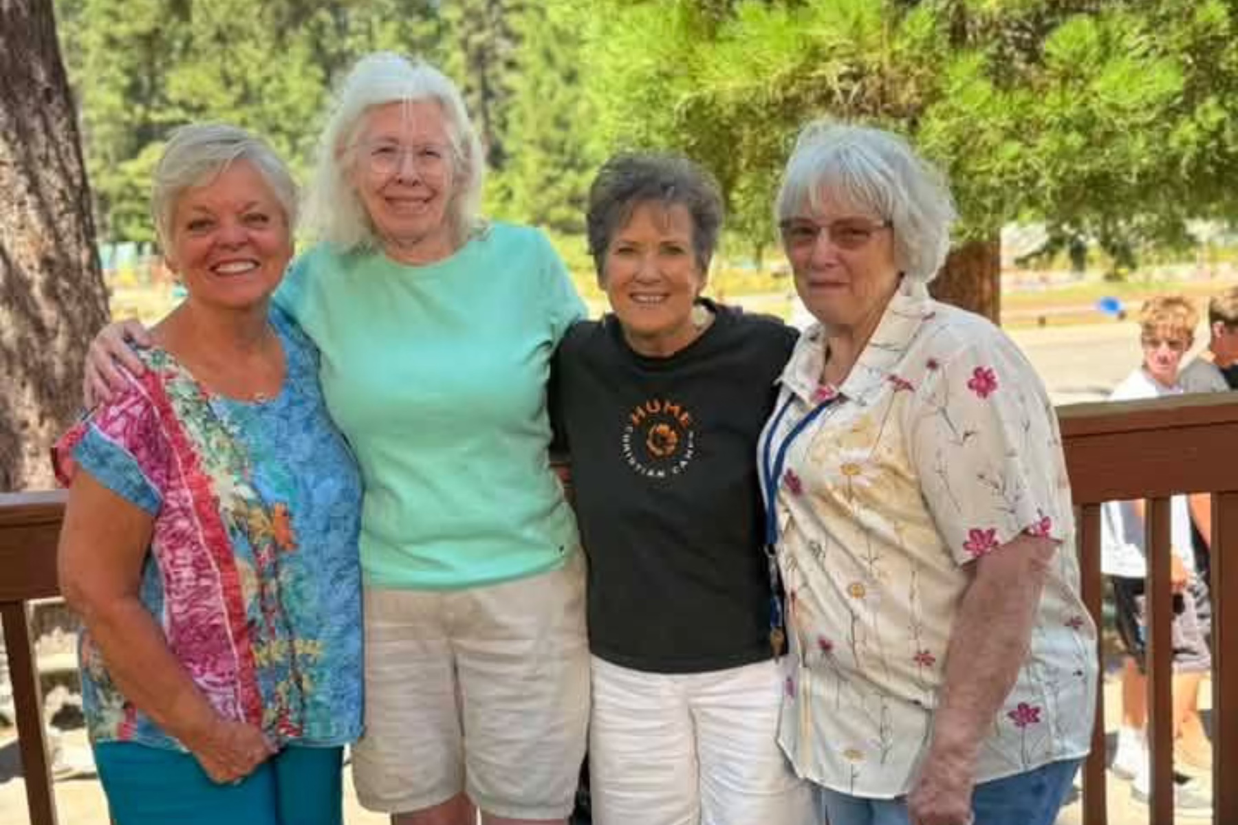 Alumni friends gathered together at the Lake