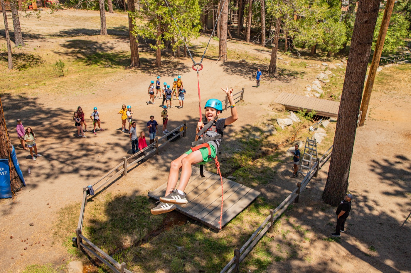 The Giant Swing at Hume Lake from above, a camper mid-swing.