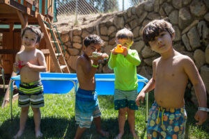 Huckleberry campers playing with water