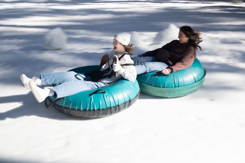 winter campers on the tube run